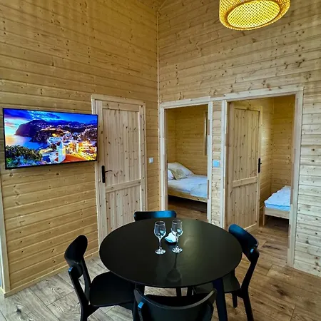 Nadmorskie Chatki, Domki Letniskowe, Balia, Sauna Semesterbostad *